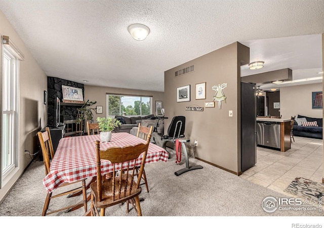 14 Douglas Dr N, Broomfield, CO 80020 - dining space with a textured ceiling and light carpet