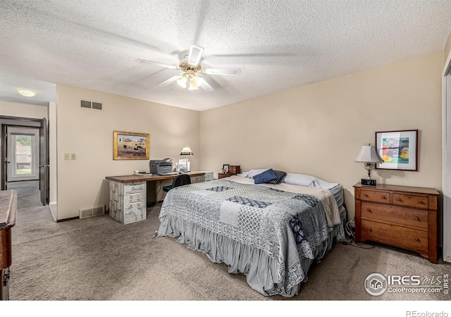 14 Douglas Dr N, Broomfield, CO 80020 - carpeted bedroom featuring a textured ceiling and a ceiling fan
