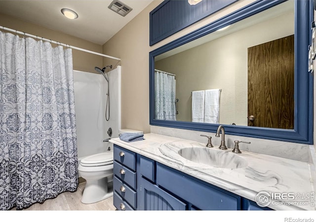 14 Douglas Dr N, Broomfield, CO 80020 - bathroom featuring vanity, wood finished floors, and curtained shower