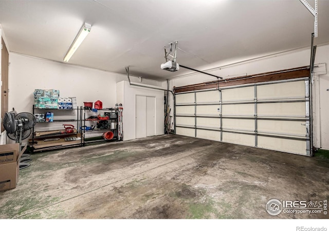 14 Douglas Dr N, Broomfield, CO 80020 - garage featuring a garage door opener