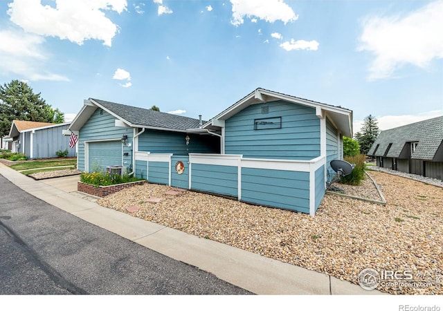 14 Douglas Dr N, Broomfield, CO 80020 - view of front of house featuring an attached garage and driveway
