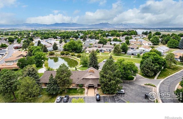 14 Douglas Dr N, Broomfield, CO 80020 - aerial perspective of suburban area with a water and mountain view