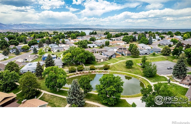 14 Douglas Dr N, Broomfield, CO 80020 - aerial perspective of suburban area with a nearby body of water
