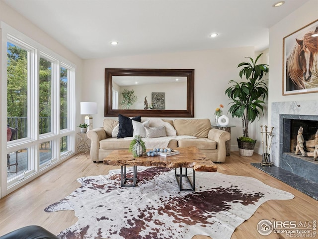 2695 Stanford Ave, Boulder, CO 80305 - living area with a fireplace, recessed lighting, and wood finished floors