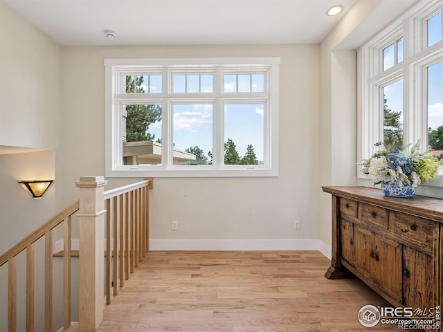 2695 Stanford Ave, Boulder, CO 80305 - hallway featuring light wood-type flooring and baseboards