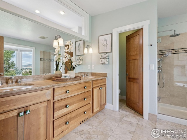 2695 Stanford Ave, Boulder, CO 80305 - full bathroom featuring double vanity and a stall shower