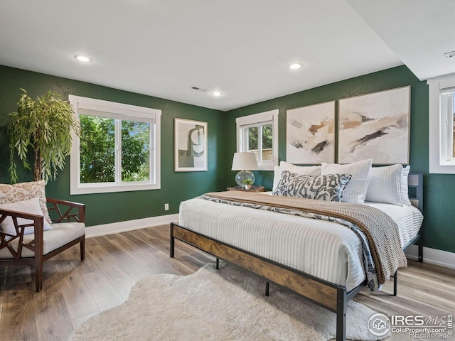 2695 Stanford Ave, Boulder, CO 80305 - bedroom with wood finished floors and recessed lighting