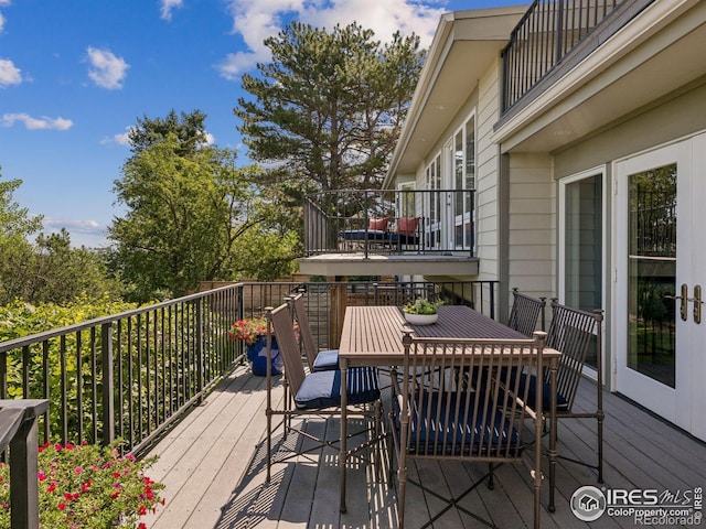 2695 Stanford Ave, Boulder, CO 80305 - wooden deck with outdoor dining space