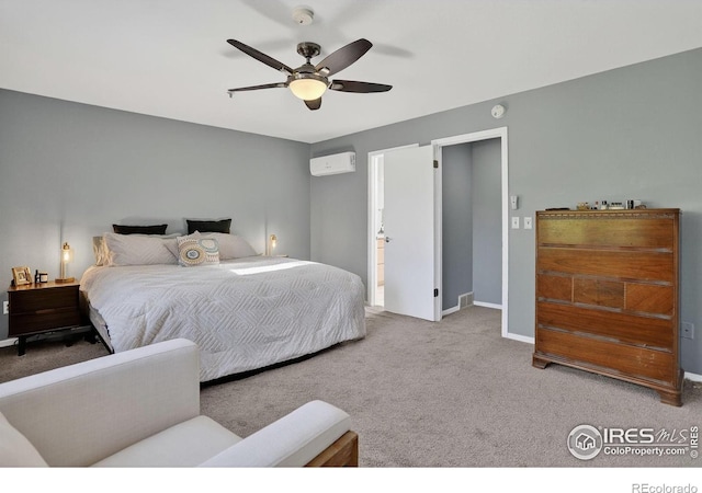 2954 Kalmia Ave # 34, Boulder, CO 80301 - carpeted bedroom with an AC wall unit, ceiling fan, and ensuite bathroom