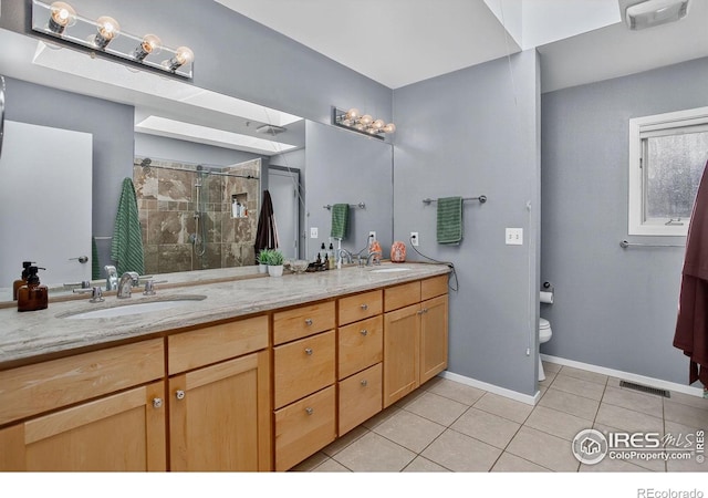 2954 Kalmia Ave # 34, Boulder, CO 80301 - full bath with tile patterned flooring, double vanity, and a stall shower