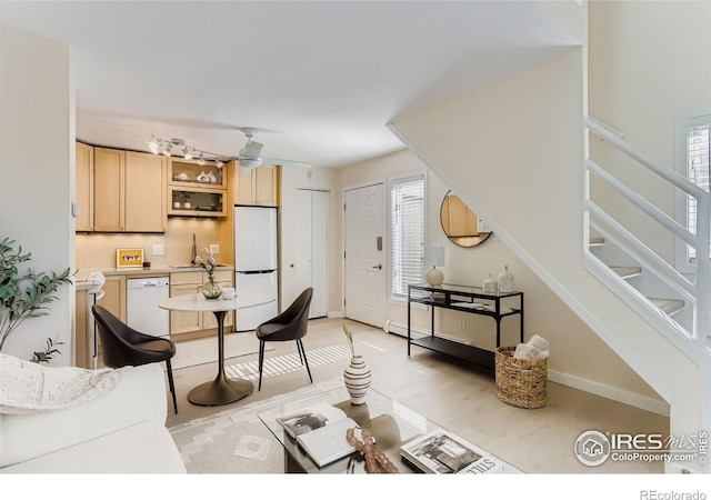 1825 Marine St Unit 8, Boulder, CO 80302 - living room with stairway and light wood finished floors