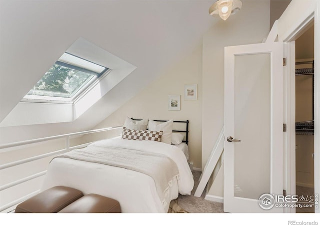 1825 Marine St Unit 8, Boulder, CO 80302 - carpeted bedroom with a skylight and lofted ceiling