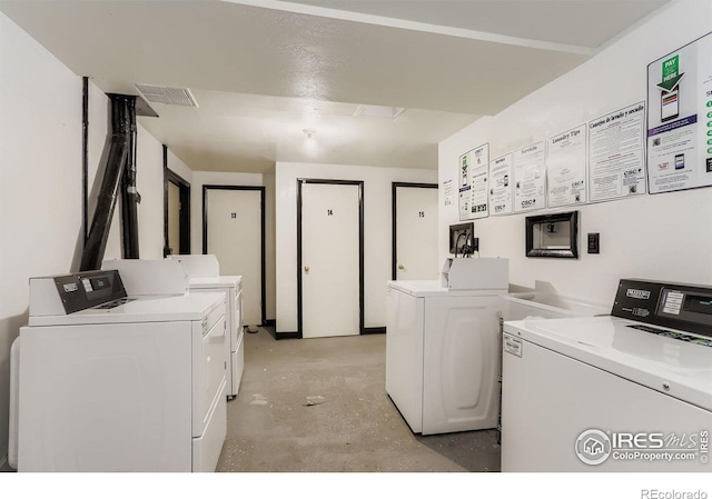 1825 Marine St Unit 8, Boulder, CO 80302 - shared laundry room featuring washer and dryer
