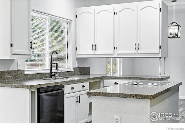 2078 Goldfinch Ct, Longmont, CO 80503 - kitchen with white cabinetry, dark countertops, black electric stovetop, and pendant lighting