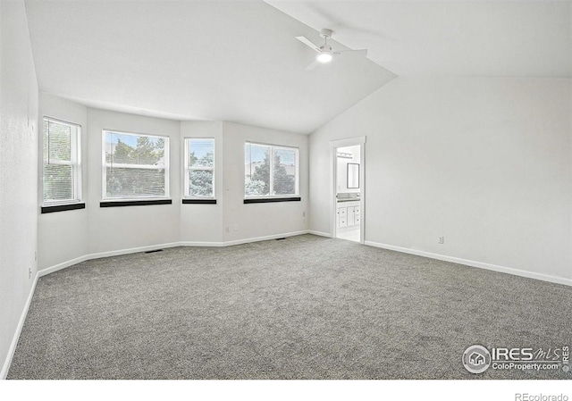 2078 Goldfinch Ct, Longmont, CO 80503 - spare room featuring ceiling fan, carpet flooring, and lofted ceiling