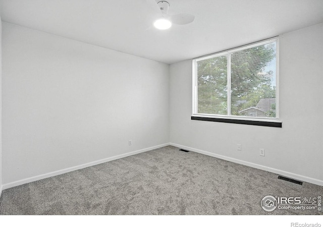 2078 Goldfinch Ct, Longmont, CO 80503 - unfurnished room with carpet, healthy amount of natural light, and a ceiling fan