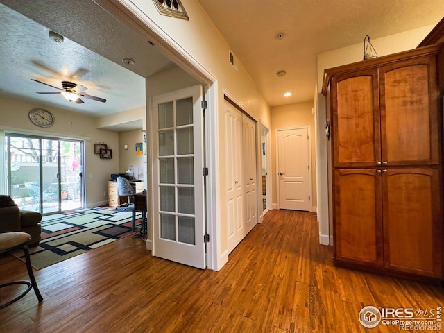 4101 Crittenton Ln Unit 102, Wellington, CO 80549 - hallway featuring wood finished floors and baseboards