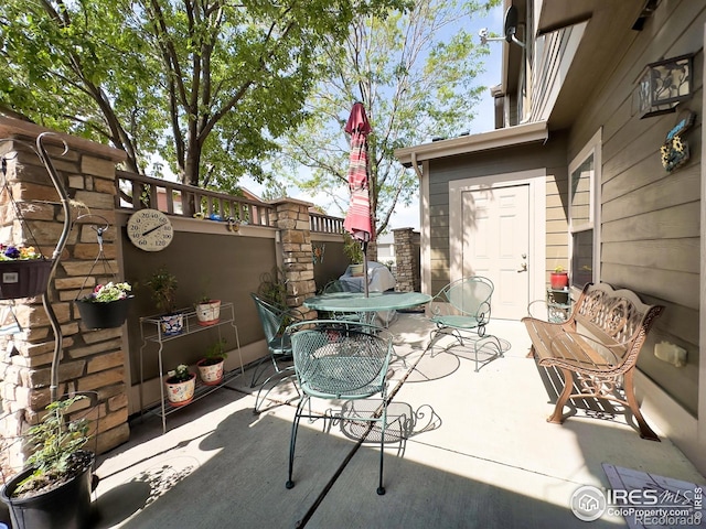 4101 Crittenton Ln Unit 102, Wellington, CO 80549 - view of patio featuring outdoor dining space