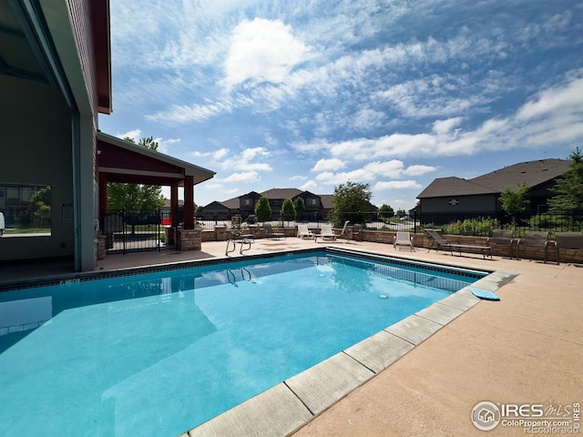 4101 Crittenton Ln Unit 102, Wellington, CO 80549 - community pool featuring a patio