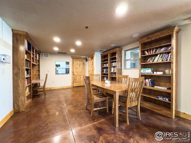4101 Crittenton Ln Unit 102, Wellington, CO 80549 - dining area with concrete floors and recessed lighting
