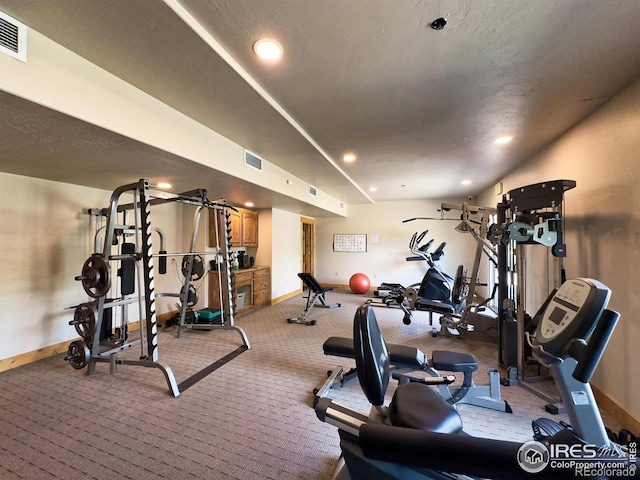 4101 Crittenton Ln Unit 102, Wellington, CO 80549 - workout area featuring light colored carpet and recessed lighting