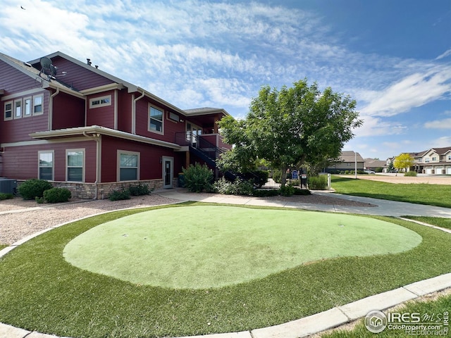 4101 Crittenton Ln Unit 102, Wellington, CO 80549 - view of community with a putting green and a residential view
