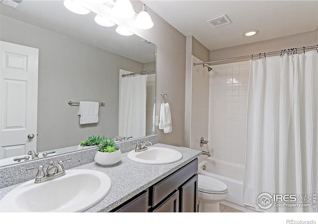 16021 Williams Pl, Broomfield, CO 80023 - full bath with shower / bath combo with shower curtain, double vanity, tile patterned flooring, and recessed lighting