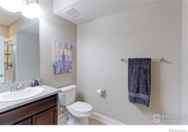 16021 Williams Pl, Broomfield, CO 80023 - full bathroom with vanity, a shower with shower door, and tile patterned floors