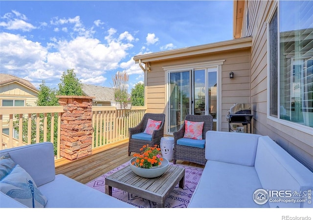 16021 Williams Pl, Broomfield, CO 80023 - wooden deck with an outdoor hangout area