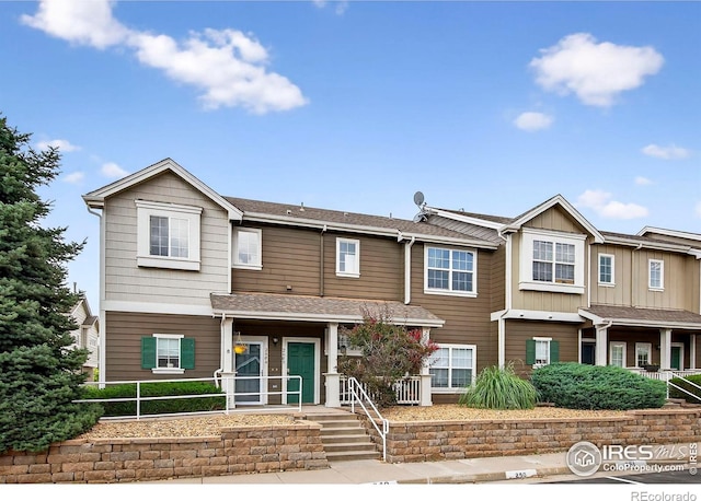 14700 E 104th Ave Unit 2605, Commerce City, CO 80022 - craftsman-style house with covered porch