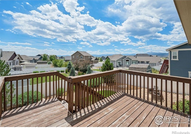 1325 Tipton St, Berthoud, CO 80513 - wooden deck featuring a residential view and a fenced backyard