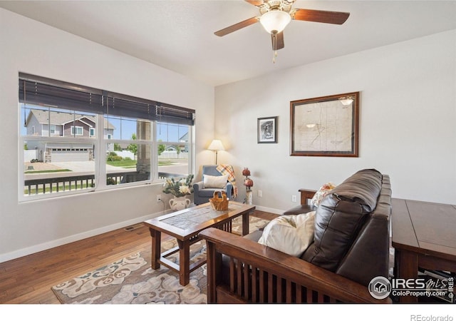 1325 Tipton St, Berthoud, CO 80513 - living area featuring wood finished floors and a ceiling fan