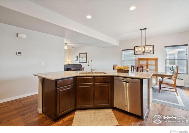 1325 Tipton St, Berthoud, CO 80513 - kitchen with stainless steel dishwasher, wood finished floors, a chandelier, a center island with sink, and recessed lighting