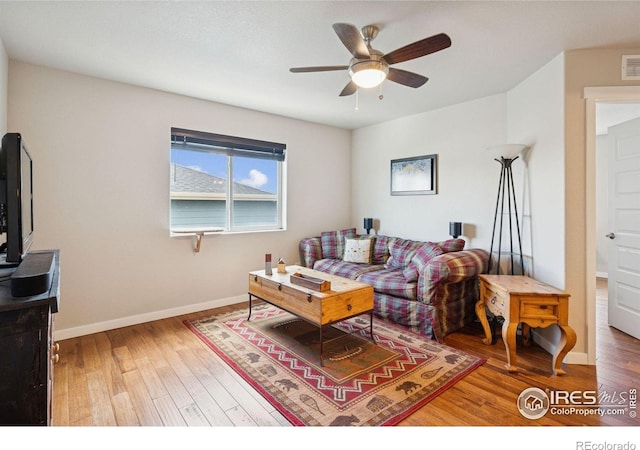 1325 Tipton St, Berthoud, CO 80513 - living room with wood finished floors and a ceiling fan