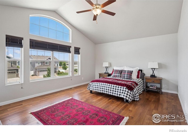 1325 Tipton St, Berthoud, CO 80513 - bedroom with hardwood / wood-style flooring, a ceiling fan, and high vaulted ceiling