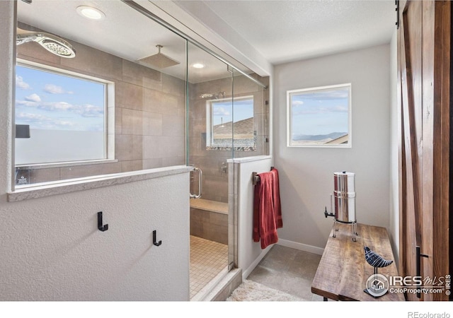 1325 Tipton St, Berthoud, CO 80513 - full bath featuring a shower stall, tile patterned floors, and recessed lighting