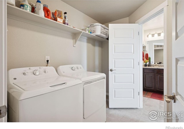 1325 Tipton St, Berthoud, CO 80513 - laundry area featuring separate washer and dryer and light tile patterned floors
