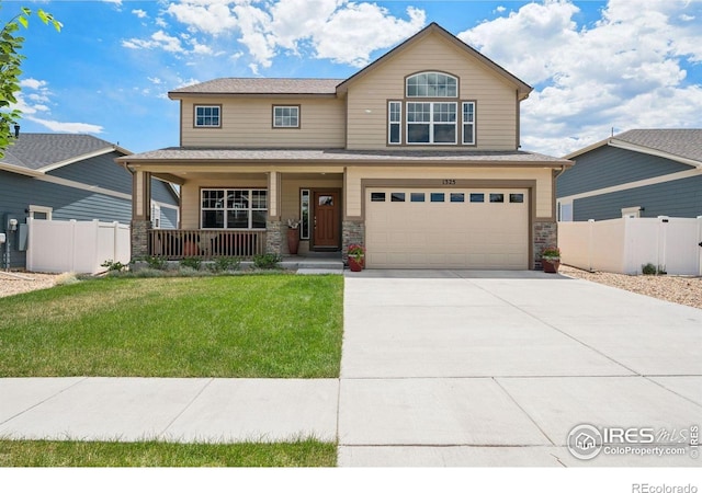 1325 Tipton St, Berthoud, CO 80513 - view of front facade featuring a garage, covered porch, driveway, and stone siding