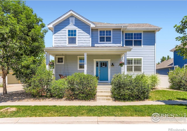 549 Jackson St, Lafayette, CO 80026 - view of front facade with a porch