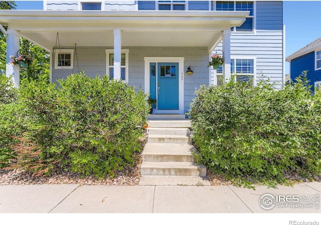 549 Jackson St, Lafayette, CO 80026 - entrance to property with a porch