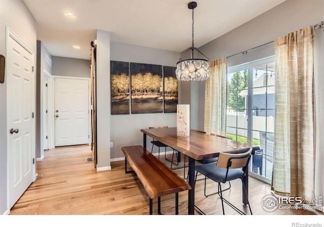 549 Jackson St, Lafayette, CO 80026 - dining area with light wood-type flooring, recessed lighting, and a chandelier