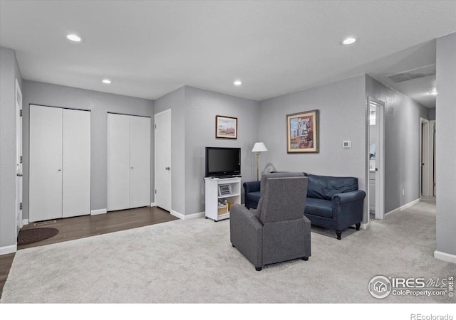 42 Scott Dr S, Broomfield, CO 80020 - carpeted living area with recessed lighting