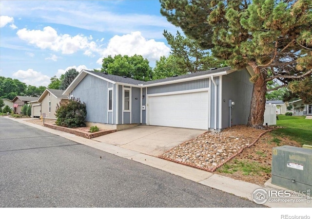 42 Scott Dr S, Broomfield, CO 80020 - ranch-style house featuring a garage and driveway