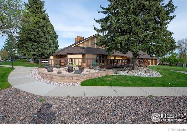 42 Scott Dr S, Broomfield, CO 80020 - back of house with a lawn and a deck