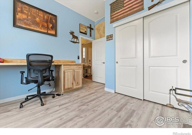 1520 Lake Vista Way, Severance, CO 80550 - office with light wood finished floors and baseboards