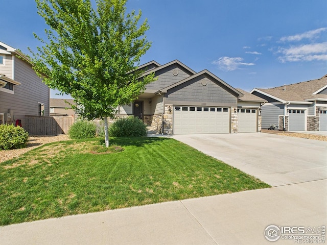 1729 Avery Plaza St, Severance, CO 80550 - craftsman house with an attached garage, driveway, and stone siding