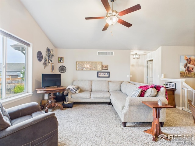 1729 Avery Plaza St, Severance, CO 80550 - carpeted living area featuring a ceiling fan and vaulted ceiling