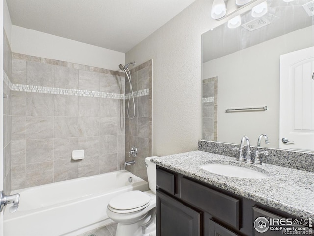 1729 Avery Plaza St, Severance, CO 80550 - bathroom featuring vanity, shower / washtub combination, and a textured wall
