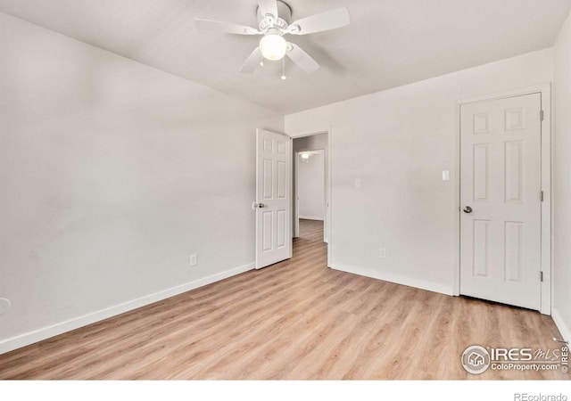 1620-1626 E 17th St, Loveland, CO 80538 - unfurnished bedroom with wood finished floors and ceiling fan