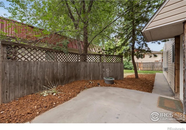 1620-1626 E 17th St, Loveland, CO 80538 - fenced backyard featuring a patio area
